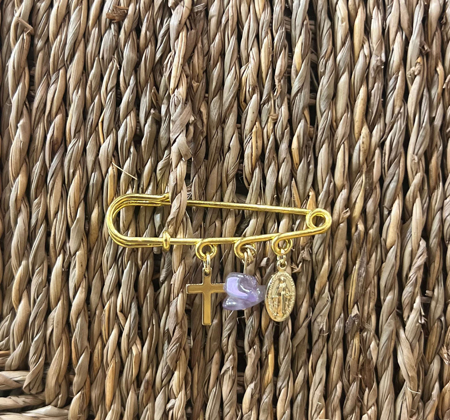 Broche porte bonheur
